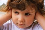 Little Girl Covering Ears ca. 2000